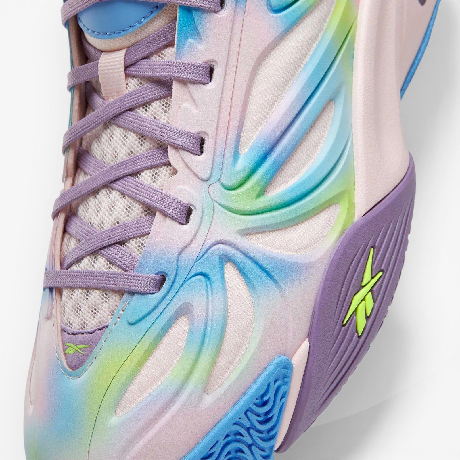 METRO Reebok Angel Reese 1 kids sneakers in atomic aqua, dream purple, and peri blue with TPU exoskeleton and lace-up closure.