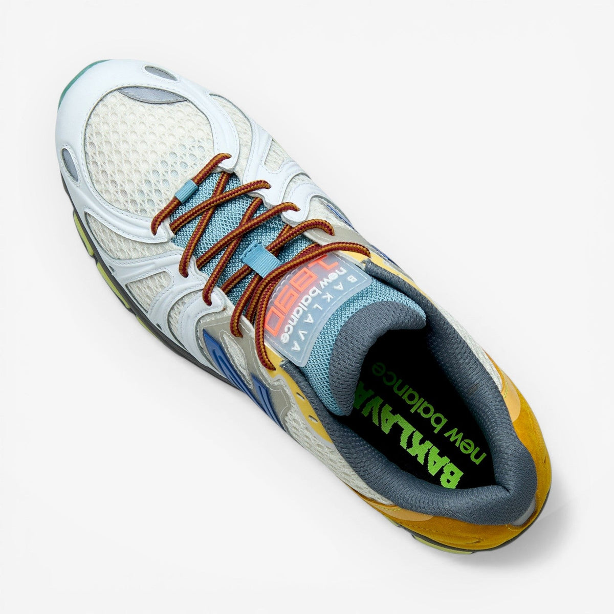 METRO Action Bronson x New Balance 1890 "Hornet / Tusk" sneakers with mesh, suede, and synthetic upper in blue, yellow, and grey.