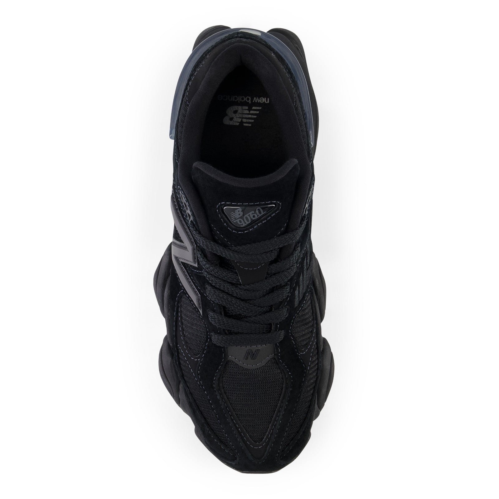 Top view of black New Balance sneaker with mesh and suede details, perfect for footwear lovers.