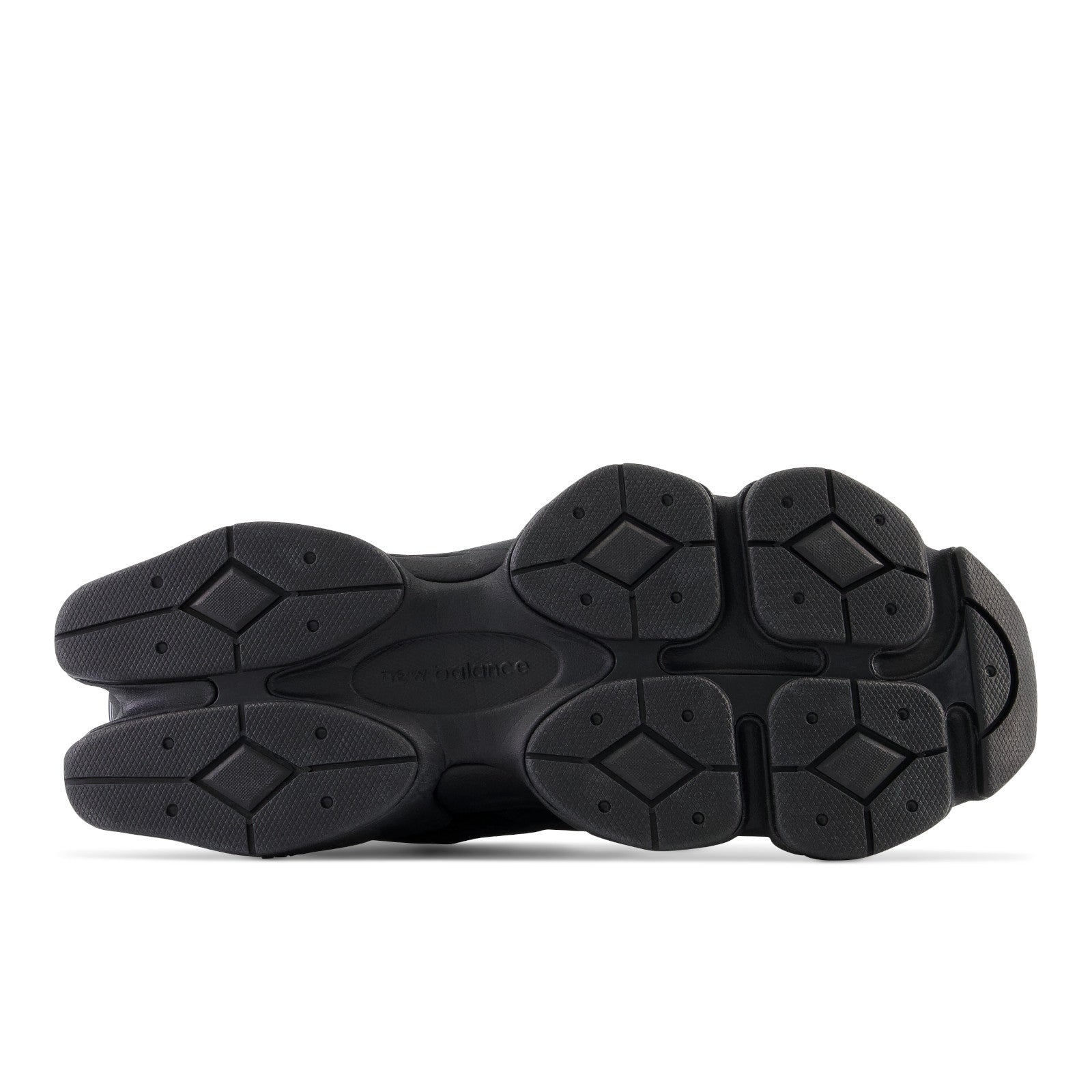 Black New Balance sneaker outsole, textured rubber sole, athletic footwear closeup