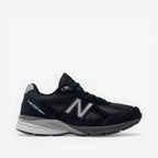 New Balance black sneaker, men's footwear, mesh and suede details, side profile