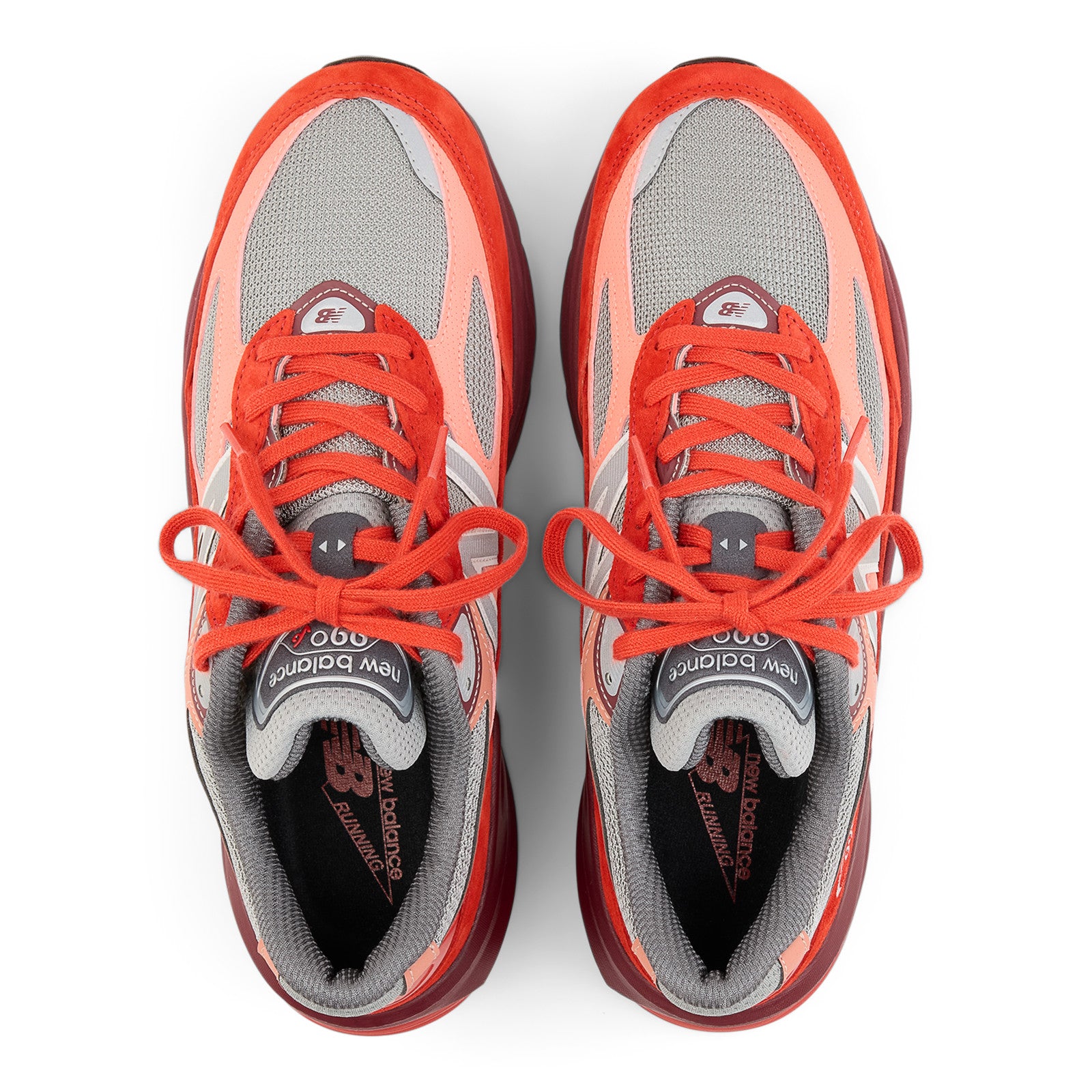 New Balance sneakers in grey and red, mesh and suede upper, top view, footwear